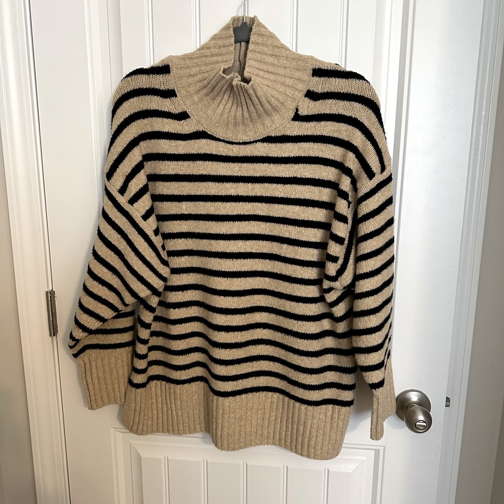 Cozy Black and Cream Striped Turtleneck Sweater